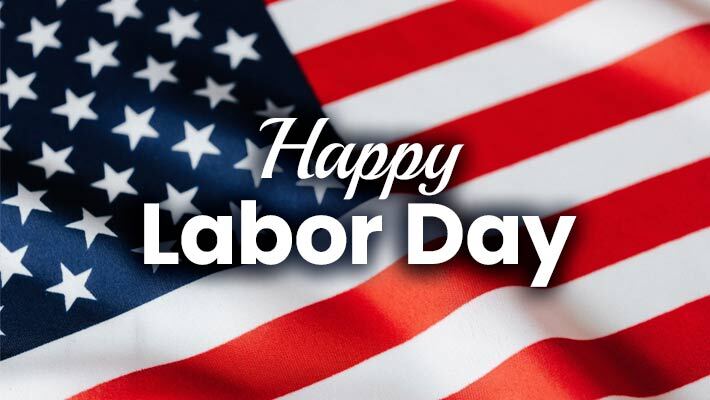 Happy Labor Day text on top of an American flag.