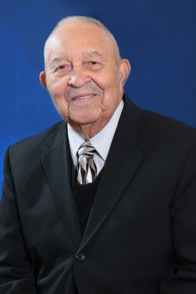 Rev. Louie B. George - Director