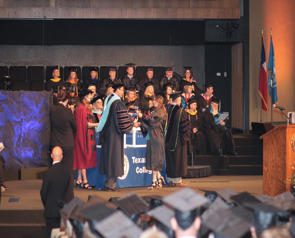 Lisa Biggers recieving diploma