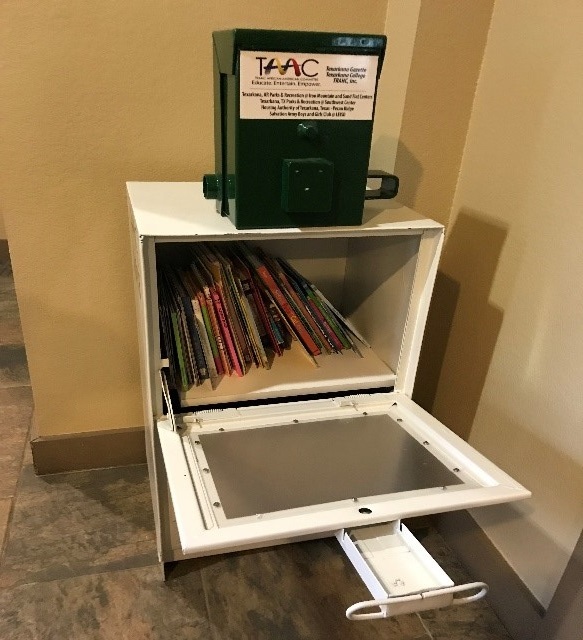 TAAC converted newspaper dispenser - door open