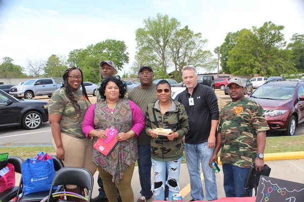 A group of individuals posing for a photo