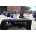 A woman sitting behind a table that reads &quot;Texas Health Steps, Texas Star Program, Your Health Plan Your Choice