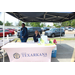 Two women behind a table that reads &quot;City of Texarkana Texas&quot;