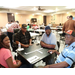 guests playing dominoes