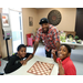 boys playing checkers