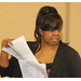 View of a woman holding documents