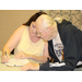 View of a man and a woman signing documents