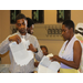 View of a man and a woman holding documents