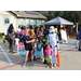 Children in a group dressed up in Halloween costumes