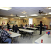 View of individuals sitting at tables