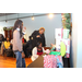 Three people at gift table