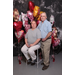 couple posing in front of heart balloons