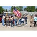 Boy Scouts with flags walking away