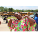 woman in floral dress posing for picture