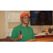 man speaking at lectern 