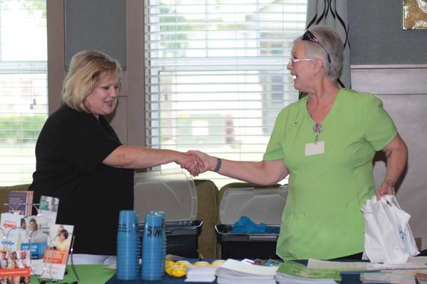 Two people shaking hands