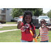 Two children playing with bubbles