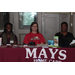 Three women at a table that reads &quot;MAYS Home Care&quot;