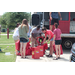 Individuals setting up balloon tanks