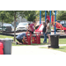 Adults setting up balloon tanks