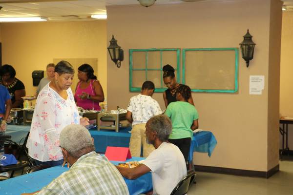 Group of people eating at a table