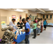 Kids in line being served food