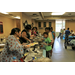 Ladies serving food to children