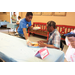 a young boy serving food