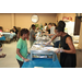 Women serving food to a child