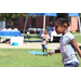 A girl playing with bubbles outside