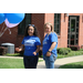 two woman standing outside having a conversation