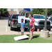 a woman and a boy doing activities outside