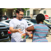 a man giving ice pops to a woman