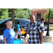 a man and a woman holding a candy bag