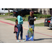 two girls holding a gift bag