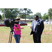 Antonio Williams speaking with a reporter