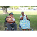 A man and a woman sitting in chairs