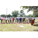 A large group of people digging with shovels