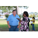 a woman talking to a man