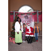 woman blinking in picture with 2 kids and santa