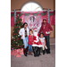 Santa posing with 2 little girls and their parents