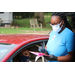 Envolve staff filling out clipboard at car window