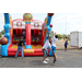 Men shooting a basketball towards a hoop