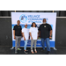 A group of 4 people posing in front of the VCTT backdrop.