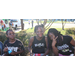 Three young girls posing for a photo. 