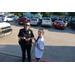 Woman officer and young girl posing for a photo.