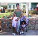 Mother and two girls posing for a photo.