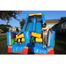 Bounce house with two children playing on it. 