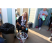 Woman with laundry basket full of items. 