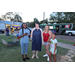 Group of women and a young girl enjoying the evening. 